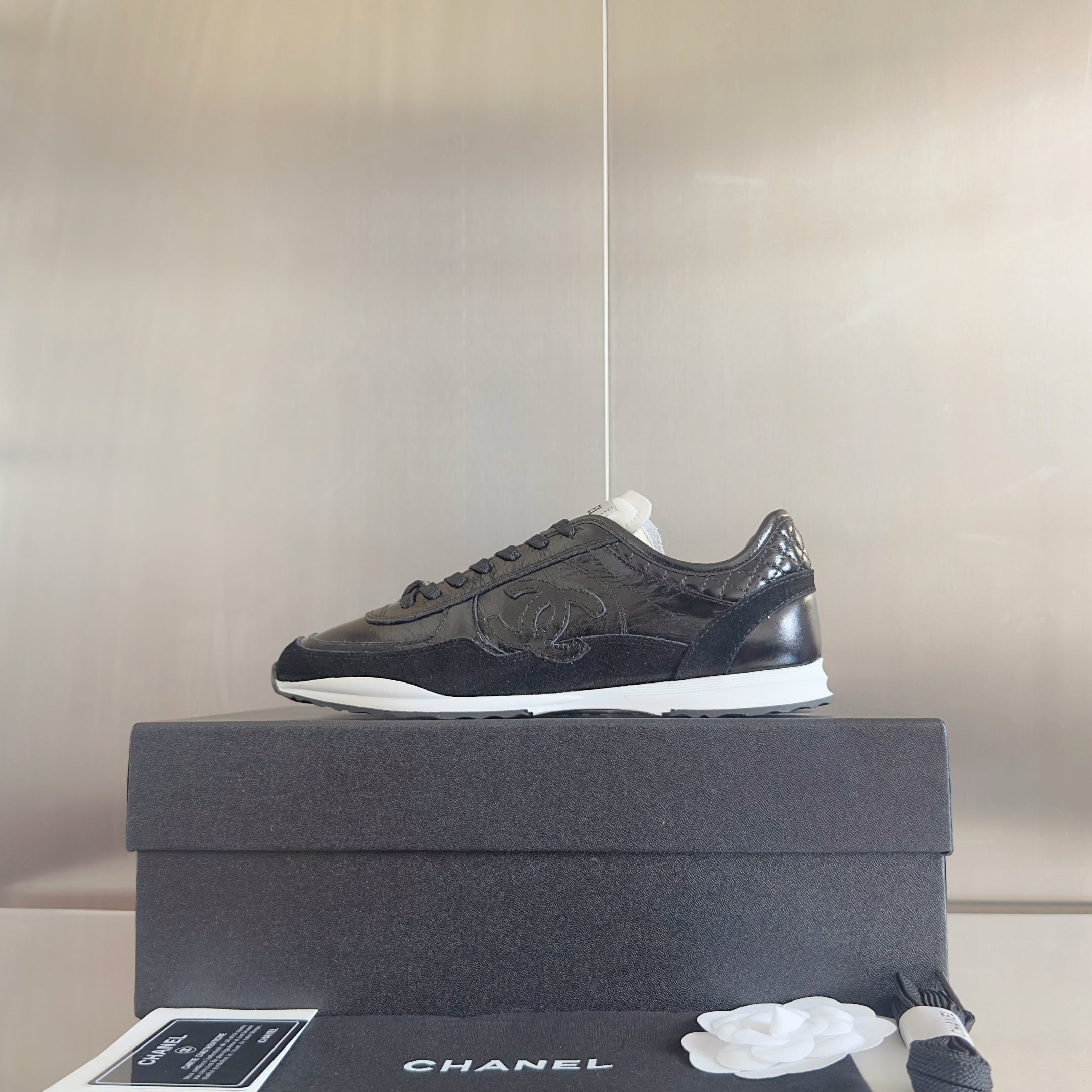 CHANEL 25S SNEAKERS 20MM IN BLACK GLOSSY CALFSKIN
