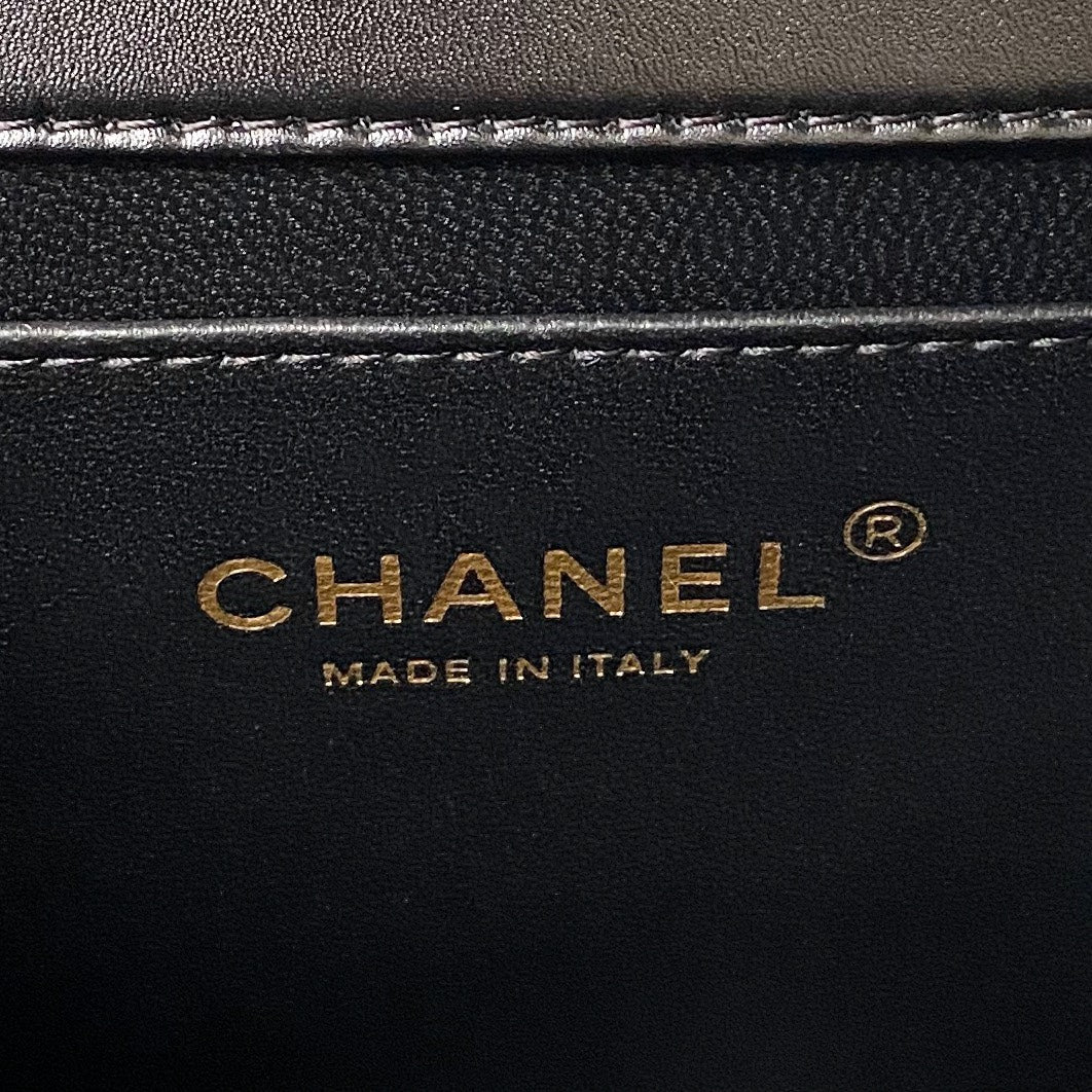 CHANEL FLAP BAG 22 IN BLACK CALFSKIN WITH DOUBLE GOLD BALL